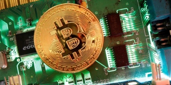 Bitcoin flies above $12,000 to one-year high as investors hedge against inflation